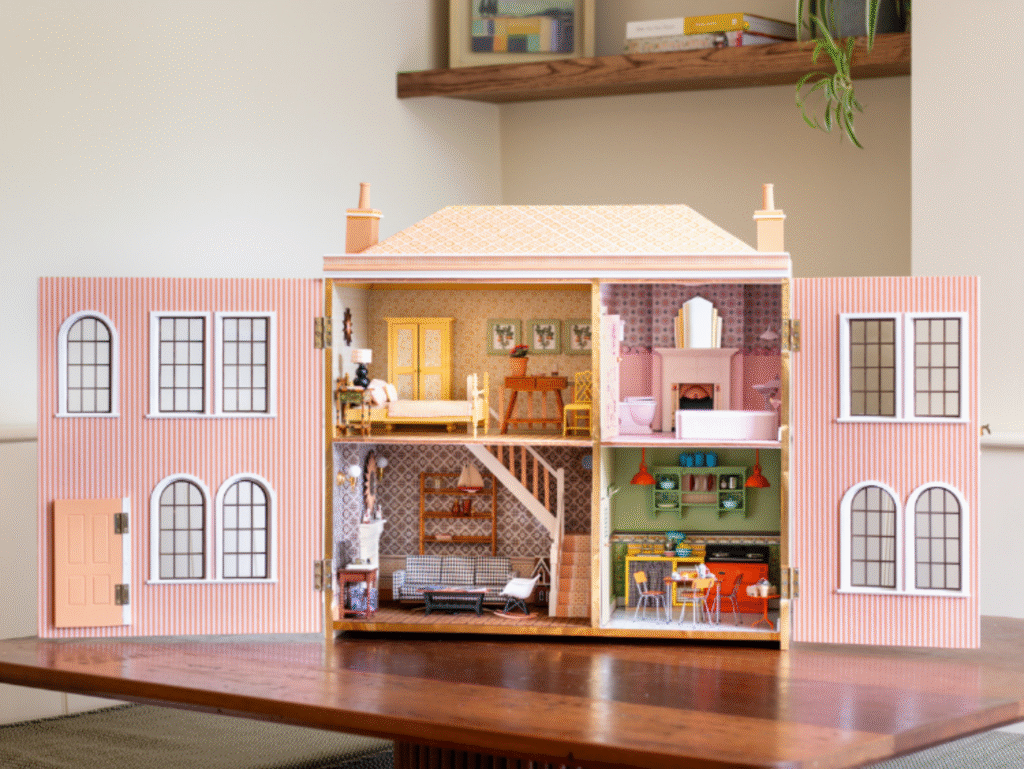 Life in miniature: This darling dolls house has it all! A