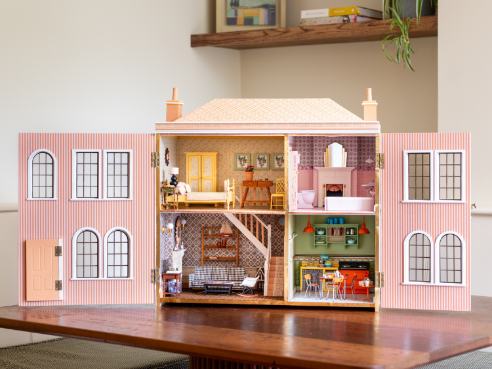 Life in miniature: This darling dolls house has it all! A