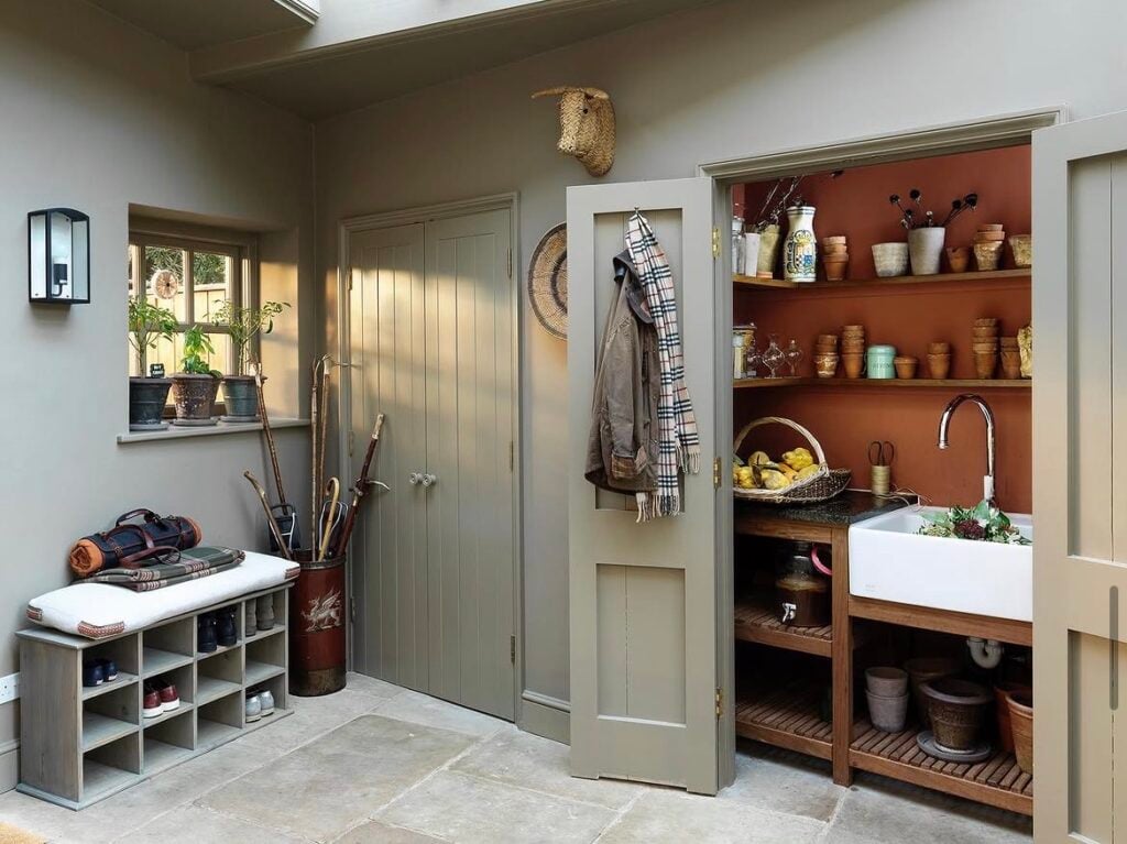 Boot room painted in Flaxen Grey with cupboard in Red Ochre by Edward Bulmer Natural Paint